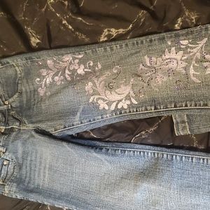 Jeans with purple pattern